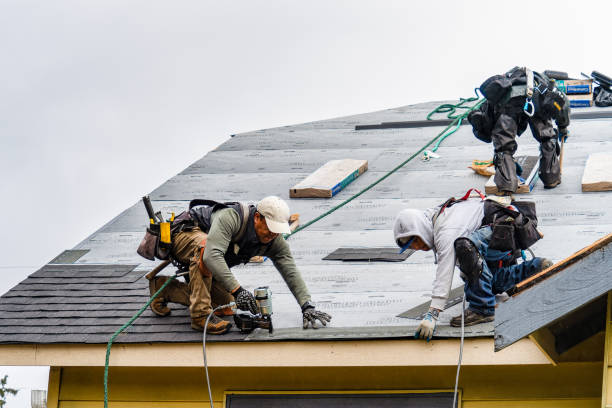 Professional Gutter Installation technician working in Elyria, OH